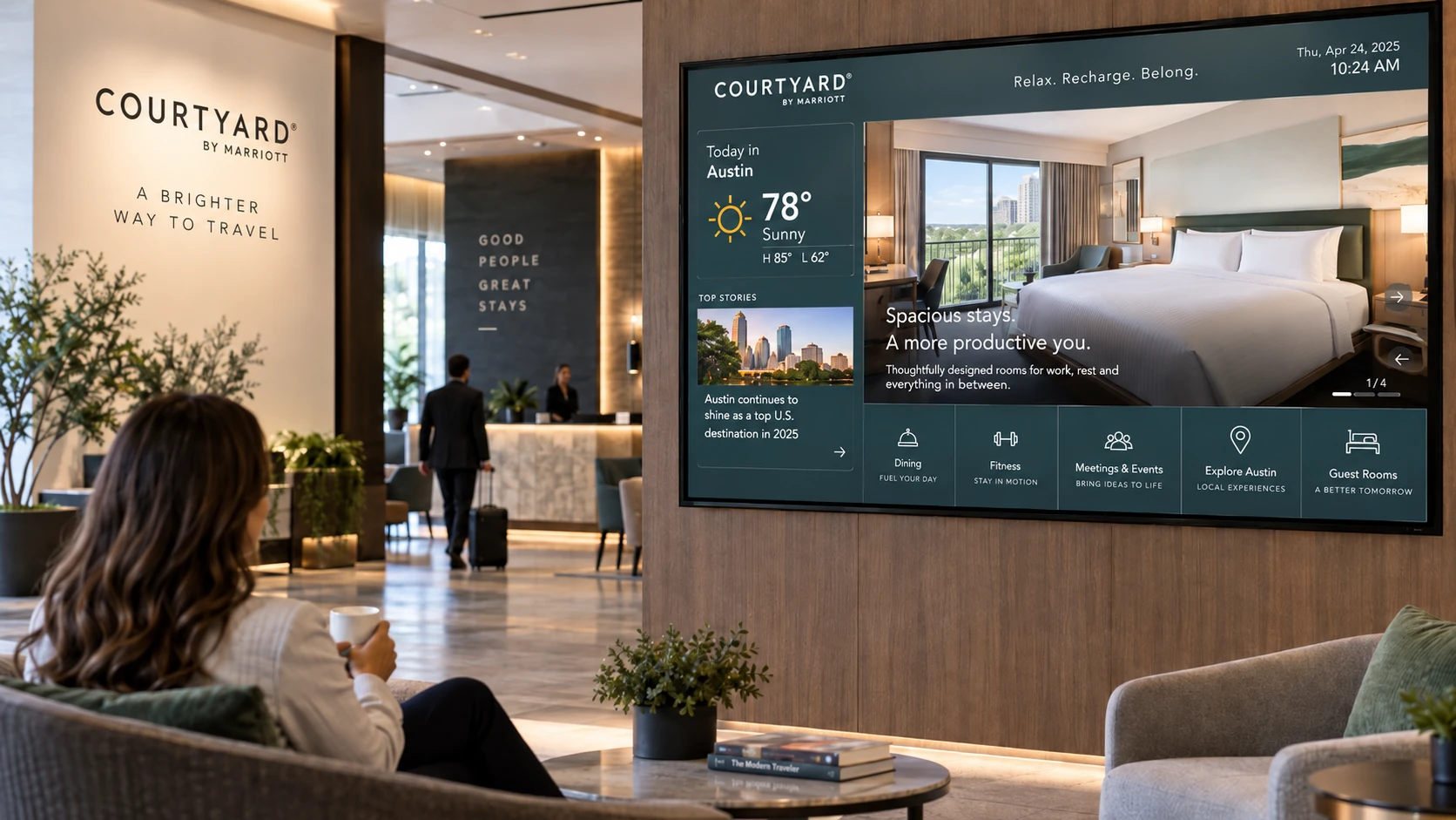 Courtyard by Marriott lobby screen showing hotel rooms, weather and news information